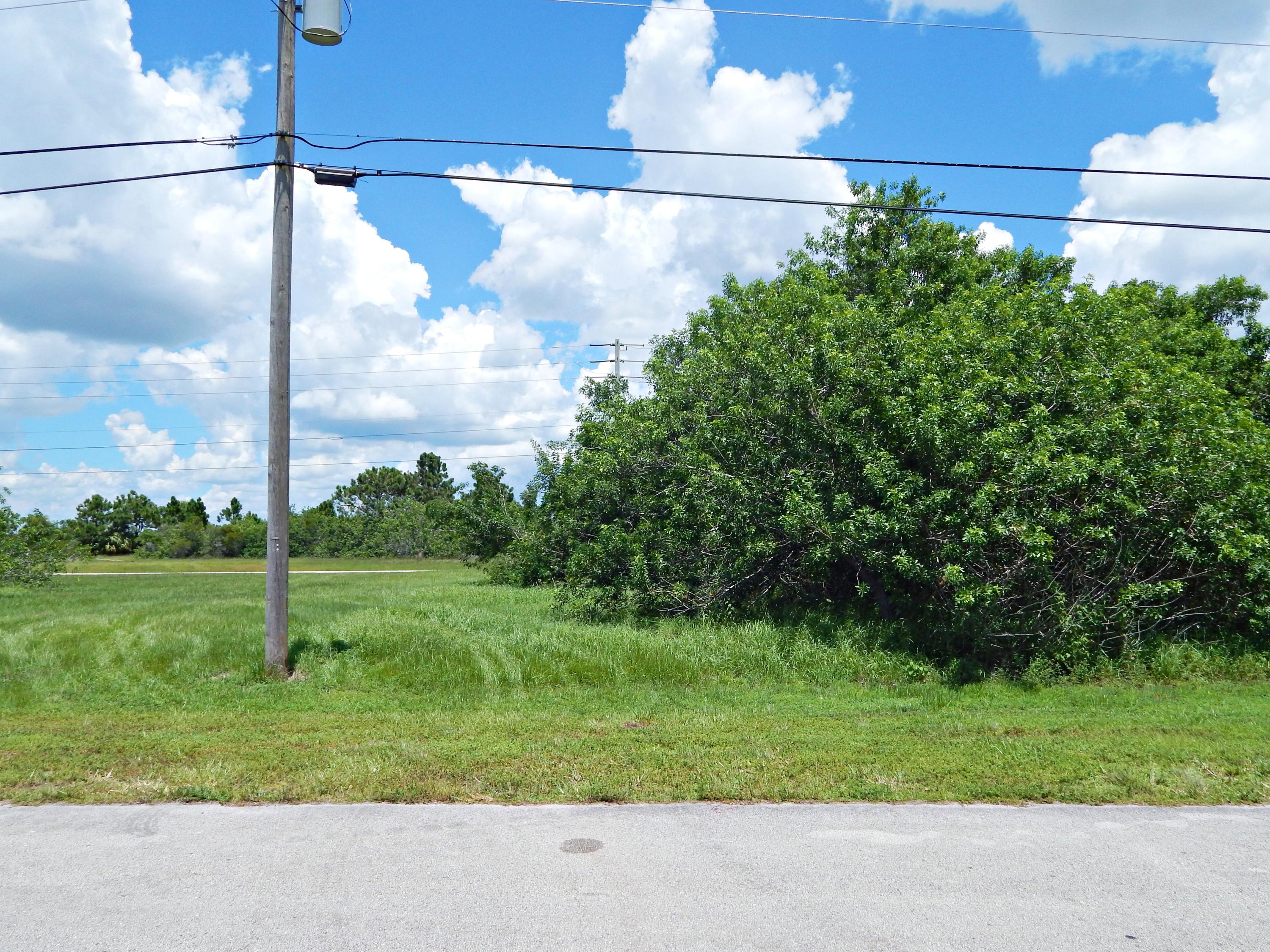 Great lot in desirable Torino! Located among brand new homes, this is as good as it gets! Backs up to a canal and quiet road for added privacy. Adjacent lot also for sale 5813 NW Dooley Cir (RX-10359252).