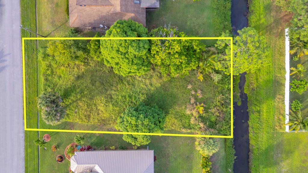 Photo of 3291 SW Mcmullen Street, Port Saint Lucie, FL 34953 (MLS # R11139688)