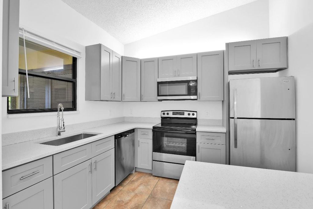 Photo of 66 Via De Casas Norte #66, Boynton Beach, FL 33426 (MLS # R11158435)