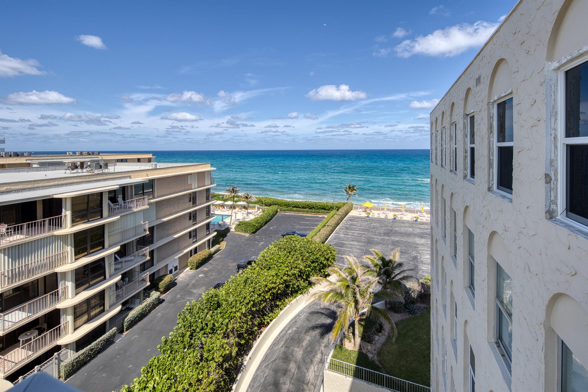 NEW NEW NEW CLEAN ! Total Remodel ! This friendly building is located on pristine South Ocean Blvd. between the World Famous Eau Hotel and The fabulous Four Seasons Spa and Resort. Wake to beautiful sunrises over the Atlantic Ocean or enjoy the evening sunsets relaxing on the private balcony, in this spacious two bedroom, two bath unit. For those who enjoy a little exercise there is a paved walking, running and bike path across from this building and runs parallel to the beautiful intra-coastal. If your preference is the water then enjoy the heated pool and sundeck or privately access the gorgeous Florida coastline and warm Atlantic Ocean/Beach! Also Includes New complete storm protection, north side of building - so beautiful views of ocean and sunsets on the Intra-coastal waterway