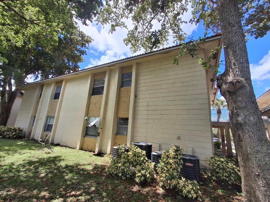 Photo of 11506 Royal Palm Boulevard #11506, Coral Springs, FL 33065 (MLS # B26035456)