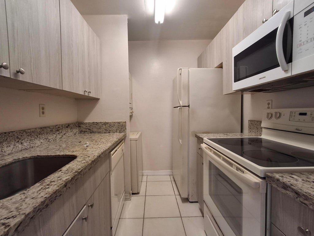 Photo of 11506 Royal Palm Boulevard #11506, Coral Springs, FL 33065 (MLS # B26035456)