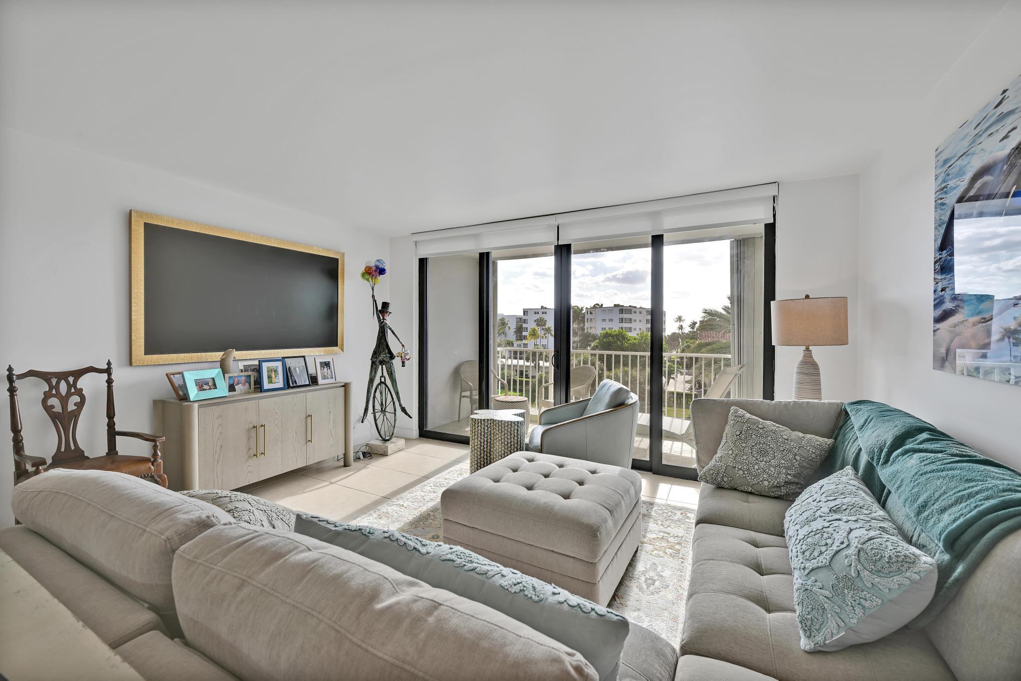 Magnificent 2 Bedroom/2 Bathroom Fully Renovated, FULLY FURNISHED, Directly on Intracoastal and Directly Across From Beach. Fully Renovated with all Impact Doors and Windows, Kitchen, Baths. Full Balcony with views of ocean and hotels (Four Seasons, Tideline). Full Amenity Building including: 24/7 Doorman, Salt Water Pool, Covered Parking, Fitness, Deeded Beach Access. Best Location, near Restaurants, Boardwalk, Farmers Market, Par 3 golf, Publix. ALSO AVAILABLE SEASONALLY (DECEMBER-APRIL) at $8,000/m