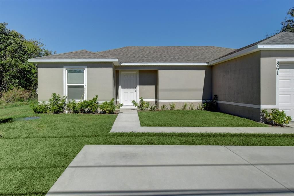 Photo of 861 SW Tulip Boulevard, Port St Lucie, FL 34953 (MLS # R10859494)