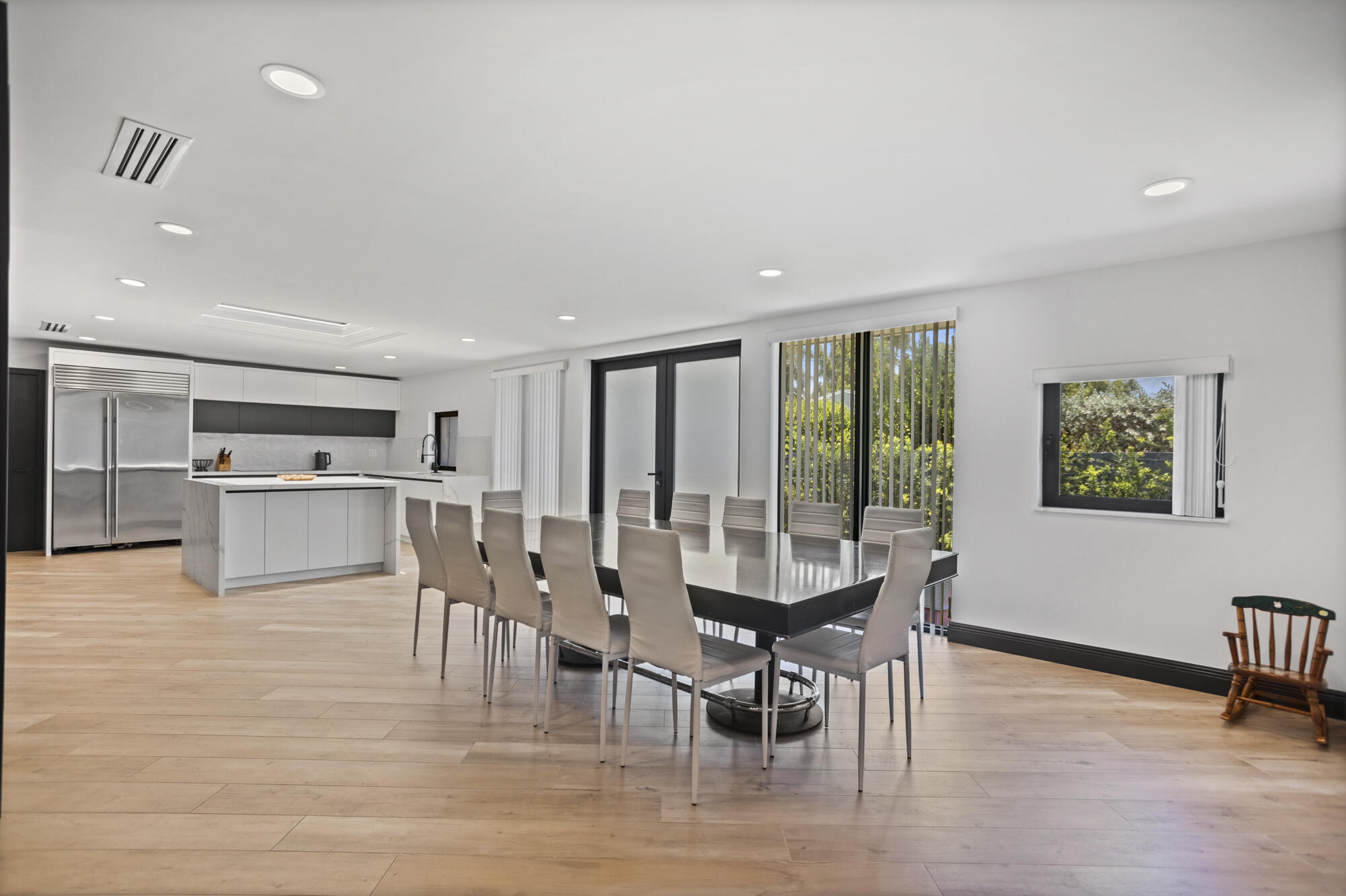 Captivating 4-Bedroom Home with Vintage Charm and Modern Elegance Nestled within the serene ambiance of City Hollywood east of US-1 on a corner lot, across form a golf course this exquisite 4-bedroom home seamlessly blends timeless elegance with contemporary comforts. Completely rebuilt in 2023, this residence boasts a rich history coupled with luxurious modern amenities, modern Gourmet Kitchen with Top Brand European appliances, panoramic high vaulted ceilings, brand new Hurricane proof Italian windows and Glass doors, spacious rooms to entertain large family, huge, yet warm dining room, kids room- all you need to call it HOME! Whether you're seeking a peaceful retreat or an inviting space to entertain, this timeless residence offers a sanctuary like no other. Call to Schedule tour today