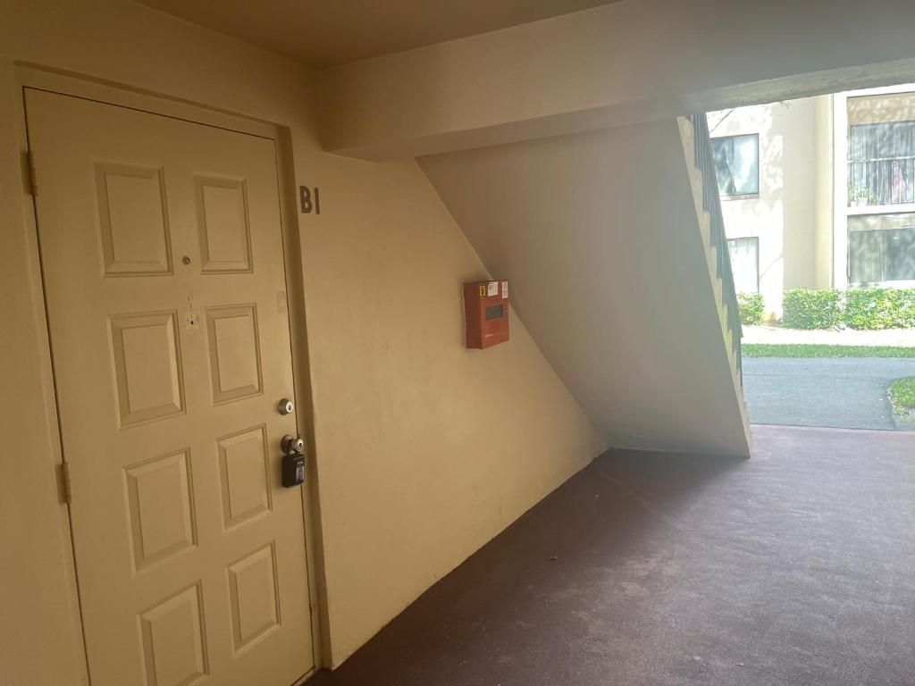 Photo of 209 Foxtail Drive #B1, Greenacres, FL 33415 (MLS # R11131623)