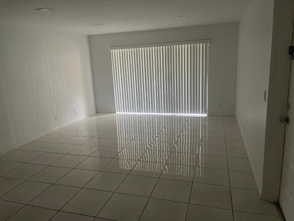 Photo of 209 Foxtail Drive #B1, Greenacres, FL 33415 (MLS # R11131623)