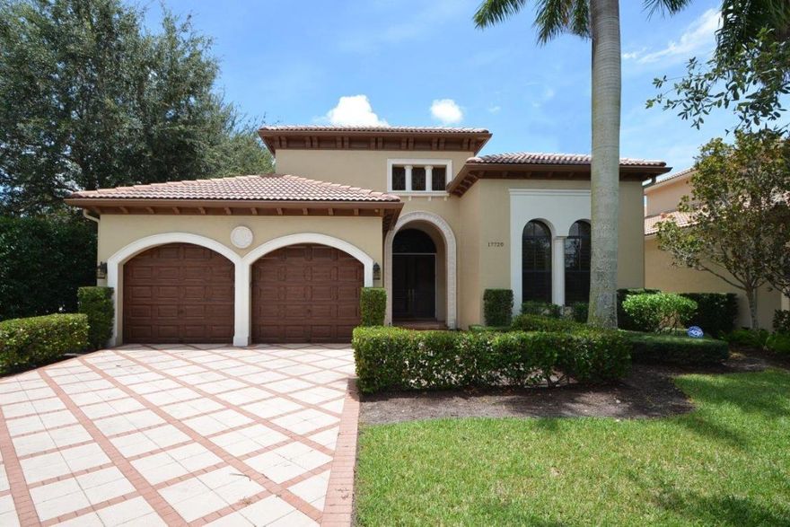 Beautiful single story pristine home with saturnia flooring, clean line appointments and moldings, on preserve lake lot with pool