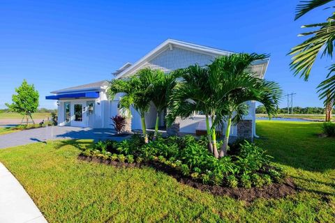 Photo of 10669 NW Suncrest Loop, Port Saint Lucie, FL 34987 (MLS # F10525010)