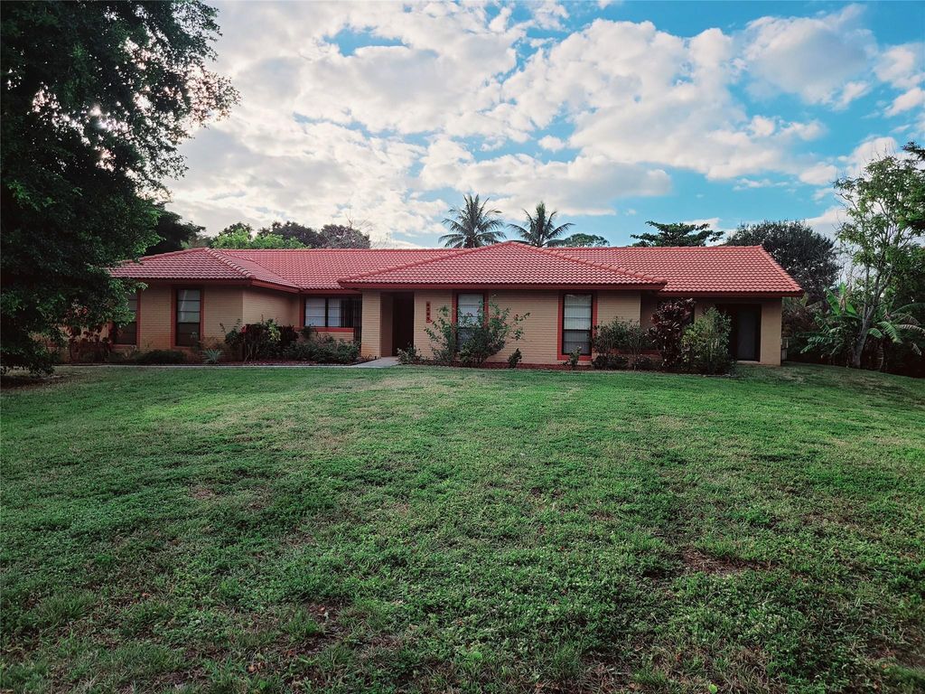 Photo of 6383 NW 62nd Terrace, Parkland, FL 33067 (MLS # F10477564)