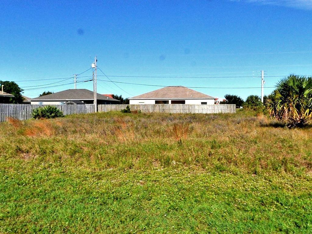 Photo of 517 SW Halden Avenue, Port Saint Lucie, FL 34953 (MLS # R10997755)