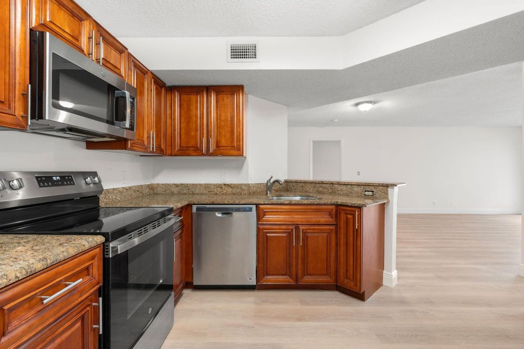 Photo of 8851 Wiles Road #108, Coral Springs, FL 33067 (MLS # F10523487)