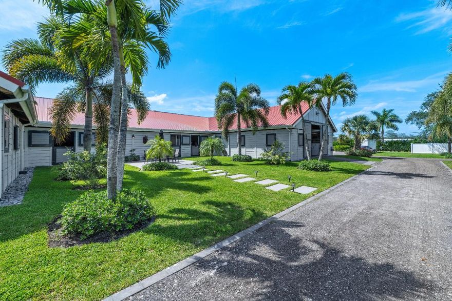 Just listed, a completely renovated, lushly landscaped, ready to go 5 acre farm well located in Wellington's South End. Serene and spacious 5 bedroom 4 bath main house perfect for family or guests. Includes 2 generators and oversized Aqua Soft Reverse Osmosis water system for house and barn. 15 stall main barn with 7 Oversized stalls featuring Amberway comfort mats, 3 stalls with walk out paddocks and 4 additional spacious paddocks. Equestrians will love the staff quarters freshly renovated with private kitchenettes for each of 2 bedrooms, along with tack room, feed room, 3 large grooming stalls and 4 wash stalls. A separate second barn boasts 3 oversized stalls, 2 with walkout paddocks. A newer Discount Dirtworks 120' x 245' fiber ring fenced with underground drainage. The ring is fenced with Amberway HDPE fencing. Just a short 8 minute drive to the new back entrance of Wellington International Showgrounds.