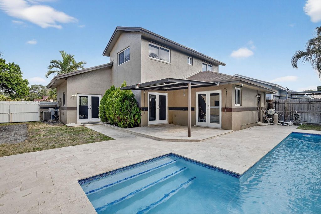 Photo of 6500 SW 13th Street, Plantation, FL 33317 (MLS # F10554339)