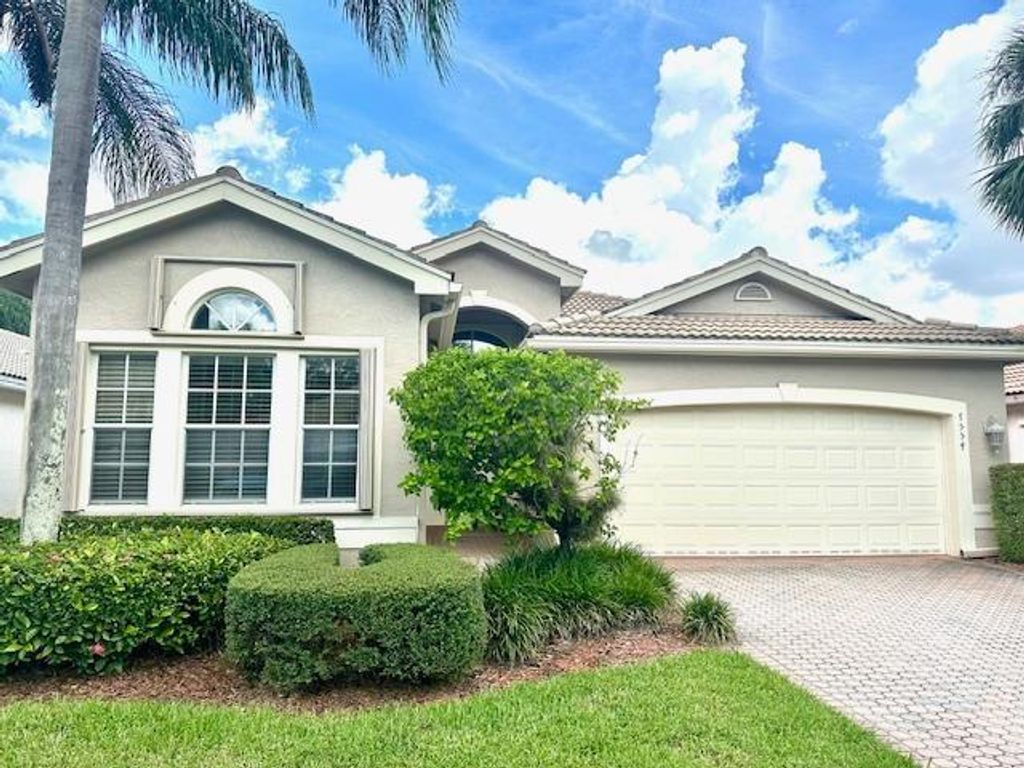 Photo of 7554 Pebble Shores Terrace, Lake Worth, FL 33467 (MLS # F10524484)