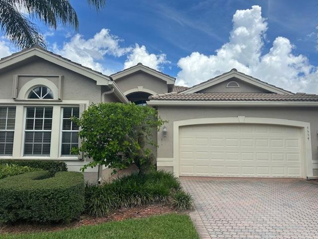 Photo of 7554 Pebble Shores Terrace, Lake Worth, FL 33467 (MLS # F10524484)
