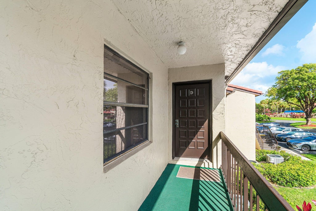 Photo of 8320 CASA DEL LAGO #D, Boca Raton, FL 33433 (MLS # B26090950)