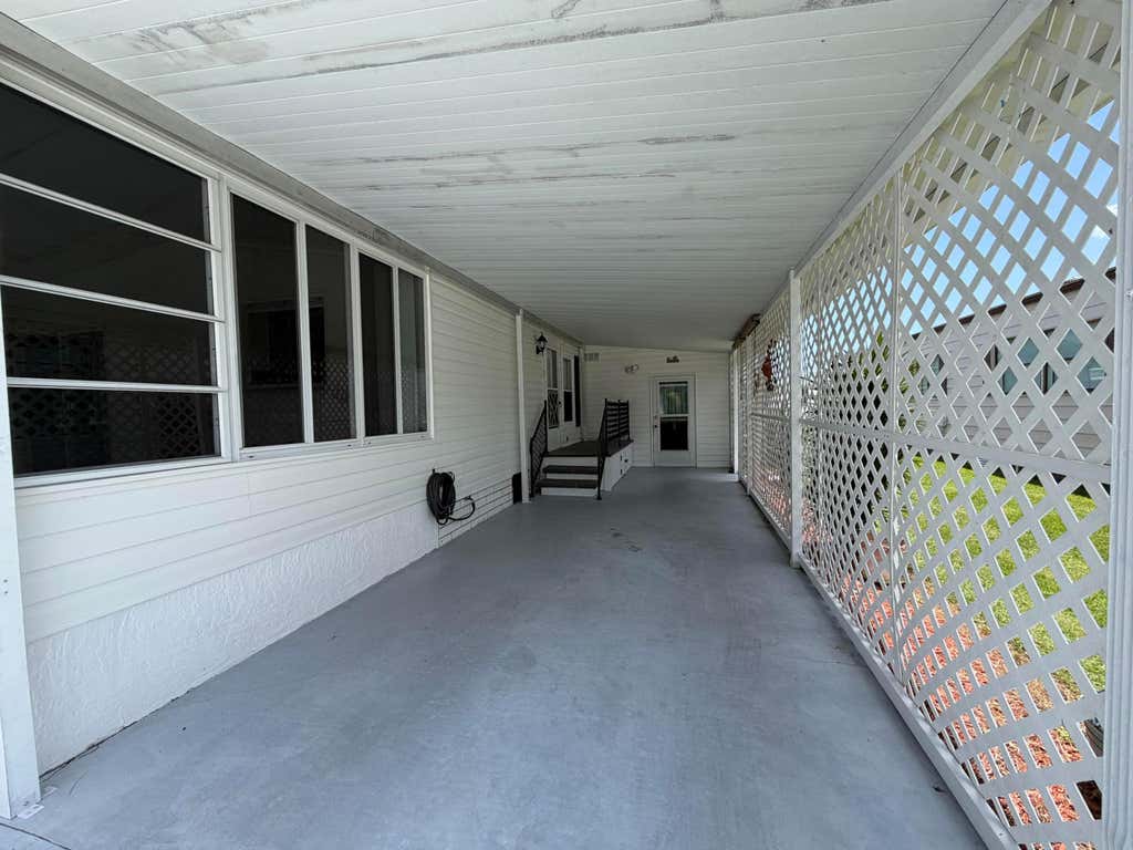 Photo of 8204 W BITTERBUSH Lane, Port Saint Lucie, FL 34952 (MLS # B26054287)