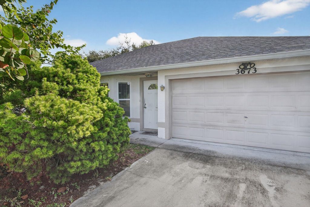 Photo of 3673 SW Vincennes Street, Port Saint Lucie, FL 34953 (MLS # F10533150)