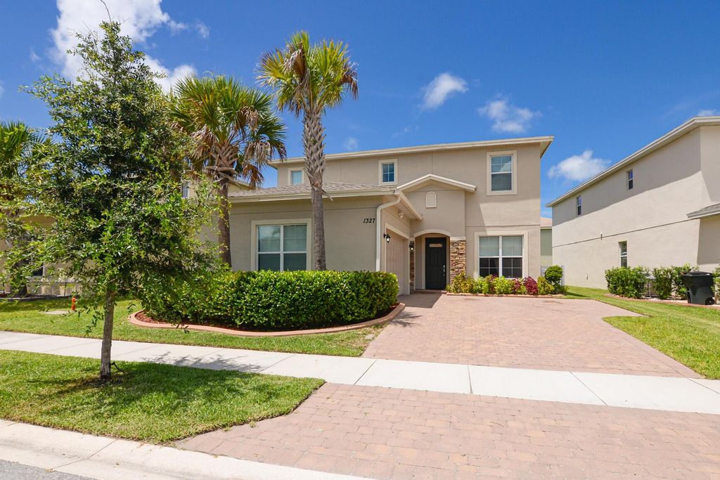 Photo of 1327 NW Leonardo Circle, Port Saint Lucie, FL 34986 (MLS # R10983717)