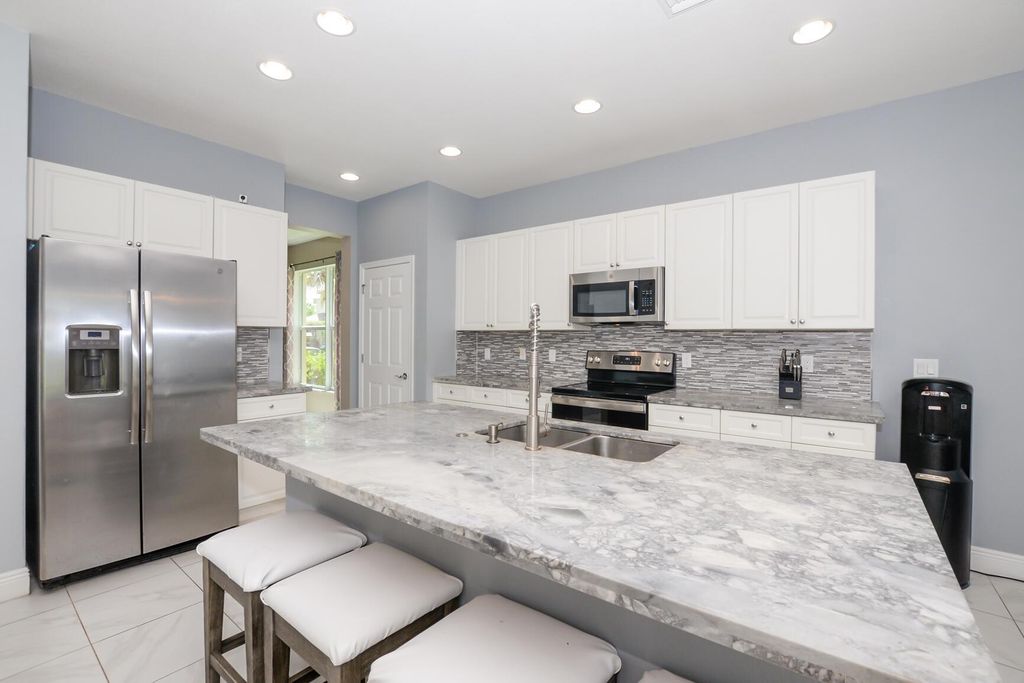 Photo of 1327 NW Leonardo Circle, Port Saint Lucie, FL 34986 (MLS # R10983717)