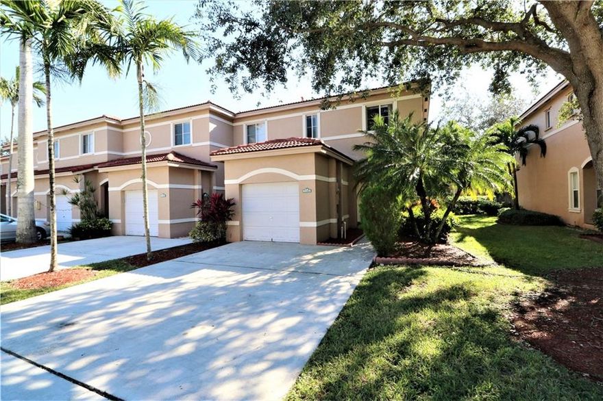 Great location on University, Gated Community, Corner Unit, New Stainless Steel Appliances & New AC, Newly Painted Interior & Garage floor, Tiles downstairs & Carpet Upstairs (Professional Cleaned), Close to Nova University, Hard Rock Hotel & Casino, Restaurants, Costco & Target Shopping Centers, & I-595, at the middle of Broward County, 1-Car garage, Long Driveway, Fenced back Yard, Hurricane Panels, Full of Day light, Clean, & Ready for Move-In.  Must see it soon!