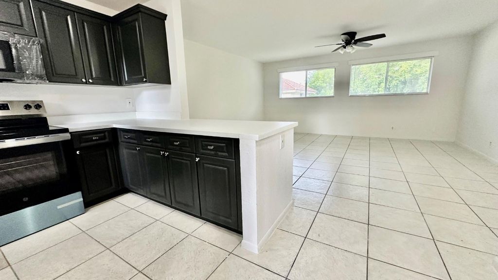 Photo of 11507 NW 43rd Street #11507, Coral Springs, FL 33065 (MLS # F10513013)