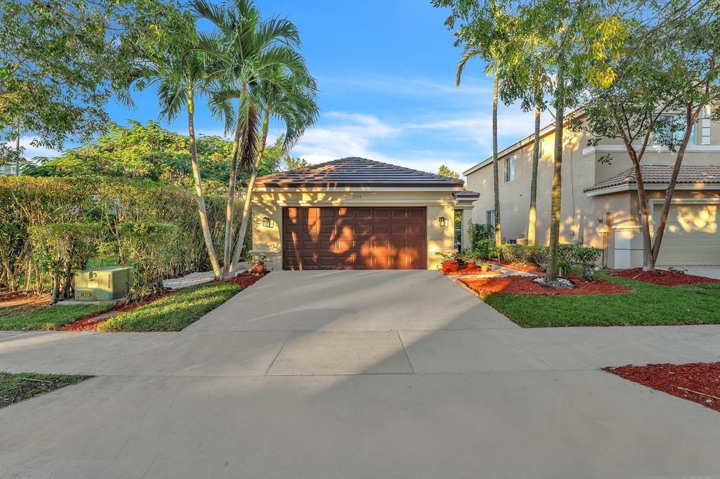Photo of 1059 Golden Cane Drive, Weston, FL 33327 (MLS # F10549710)