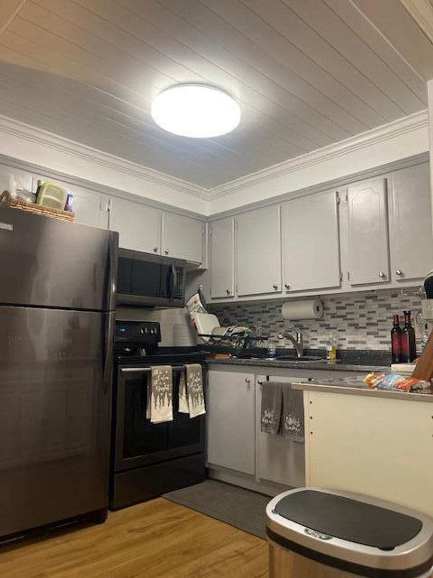 WONDERFUL IN WEST PALM BEACH - UPDATED - FULLY FURNISHED - TURNKEY - 1BR 1.5BA CONDO IN SUNNY WEST PALM BEACH. JUST BRING YOUR CLOTHES.  ENERGY EFFICIENT SPLIT AC/HEATER SYSTEM FOR YEAR ROUND COMFORT. WOOD SHIPLAP ACCENT WALL AND BEAUTIFUL VINYL 8-INCH WIDE WOOD PLANKS.  Century Village is a 55+ community with so much to offer.Large theatre with shows, movies, clubs, pools, security, and transportation service. The Clubhouse features a theater, indoor pool, card room, community/party room, billiard room and more. Shuffleboard, tennis, pickle ball, bocce, and one indoor pool + Numerous outdoor pools throughout the community. Separate fitness center with gym and outdoor heated pool & resistance pool. Two staffed gates and 24-hour roving security patrol.