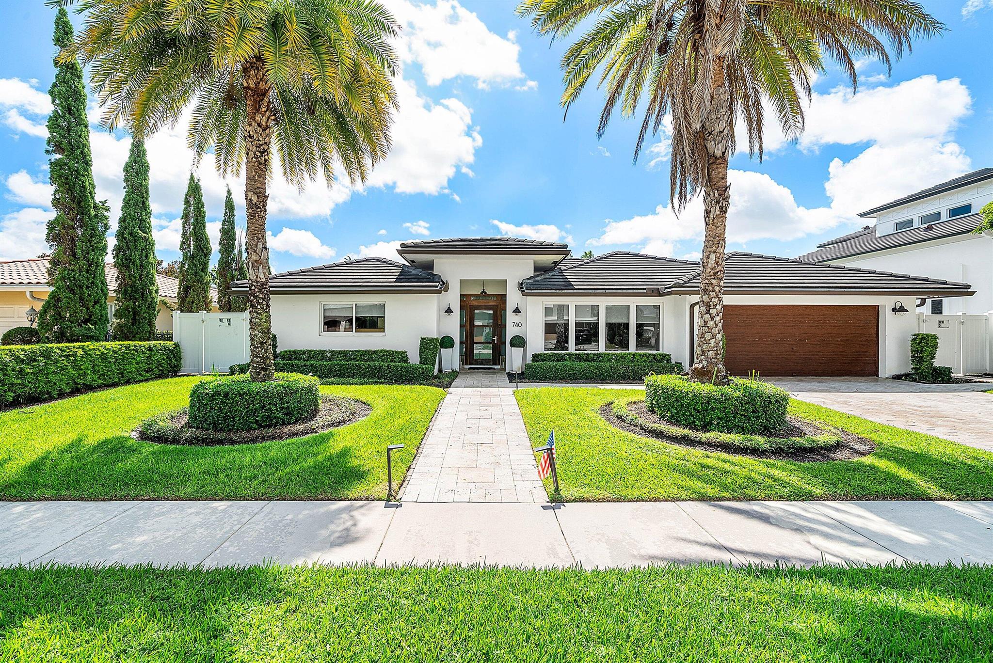 Stunning 4 bed/3.5 bath waterfront home located in the highly desirable Lake Rodgers Isle community featuring 80 feet of private dock space with a 25,000 pound boat lift. No fixed bridges to the ocean and just minutes to Lake Boca and the inlet. This light filled residence features an open floorplan with high end finishes, a custom kitchen with Wolf appliances and handcrafted cabinetry. Additional highlights include hurricane impact windows and doors, saltwater heated pool and spa. Enjoy outdoor living under a covered patio with lush tropical landscaping.  Nestled in a peaceful enclave with no HOA, and just minutes from Boca Raton's finest beaches, top rated schools, shopping, and dining. Luxury waterfront living at its best!