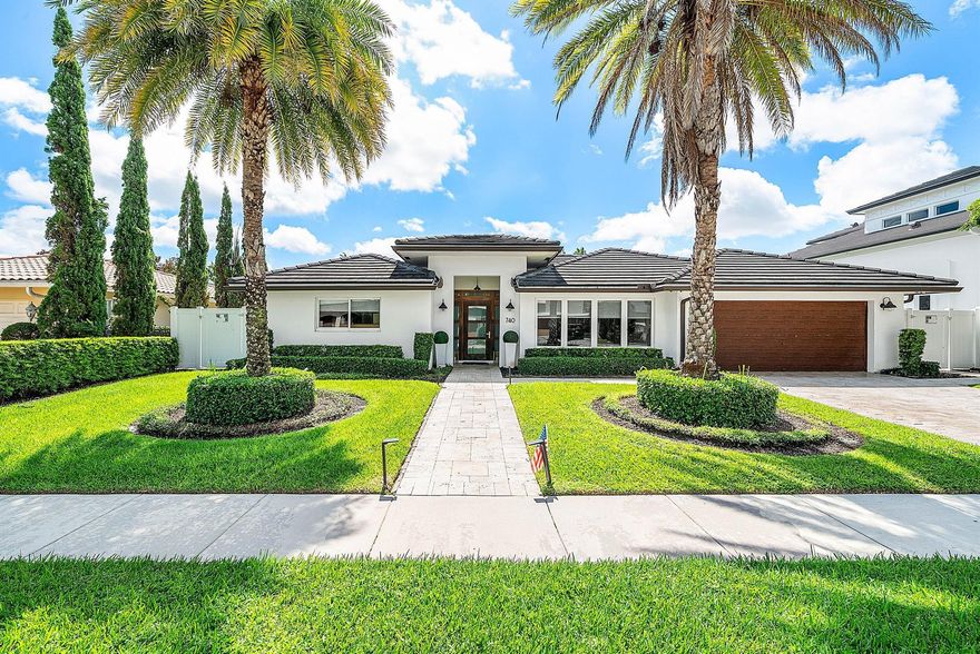 Stunning 4 bed/3.5 bath waterfront home located in the highly desirable Lake Rodgers Isle community featuring 80 feet of private dock space with a 25,000 pound boat lift. No fixed bridges to the ocean and just minutes to Lake Boca and the inlet. This light filled residence features an open floorplan with high end finishes, a custom kitchen with Wolf appliances and handcrafted cabinetry. Additional highlights include hurricane impact windows and doors, saltwater heated pool and spa. Enjoy outdoor living under a covered patio with lush tropical landscaping.  Nestled in a peaceful enclave with no HOA, and just minutes from Boca Raton's finest beaches, top rated schools, shopping, and dining. Luxury waterfront living at its best!