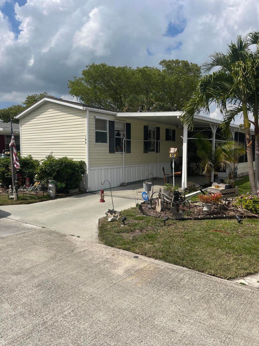 Photo of 144 Plantation Boulevard, Lake Worth, FL 33467 (MLS # R10969862)