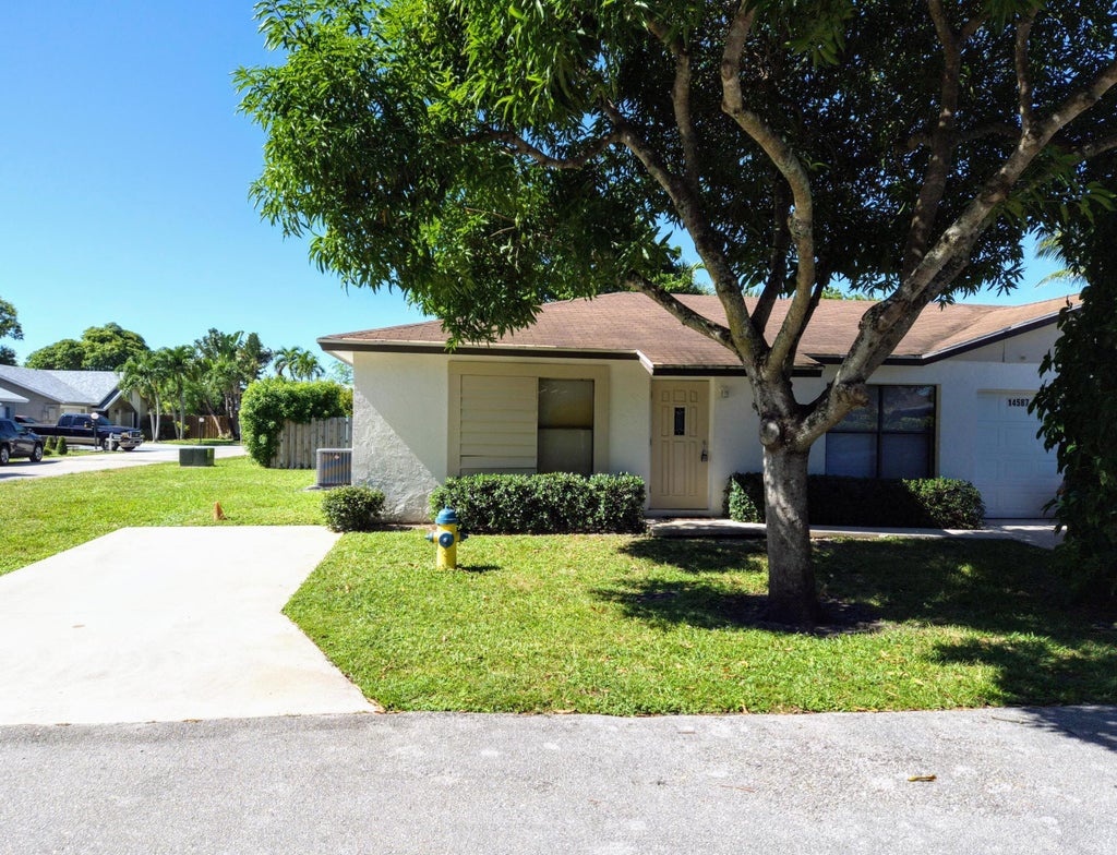 Photo of 14587 Wood Pine Drive, Delray Beach, FL 33445 (MLS # R11130966)