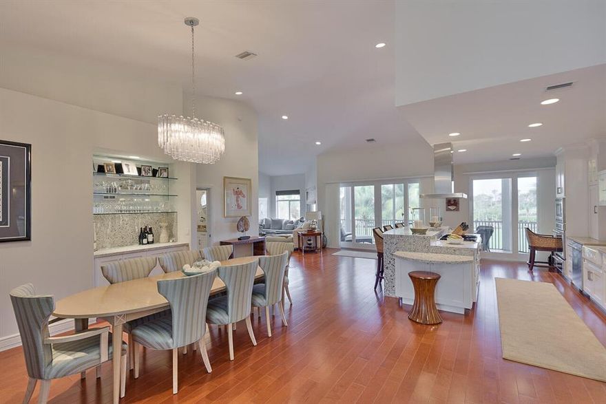 Updated 2nd Floor Unit - This condo was renovated a few years ago and it has all new flooring, new baths, new kitchen, new appliances and new impact sliders.  Once you enter you will find an open kitchen and family room plan that overlooks the waterway and green space.