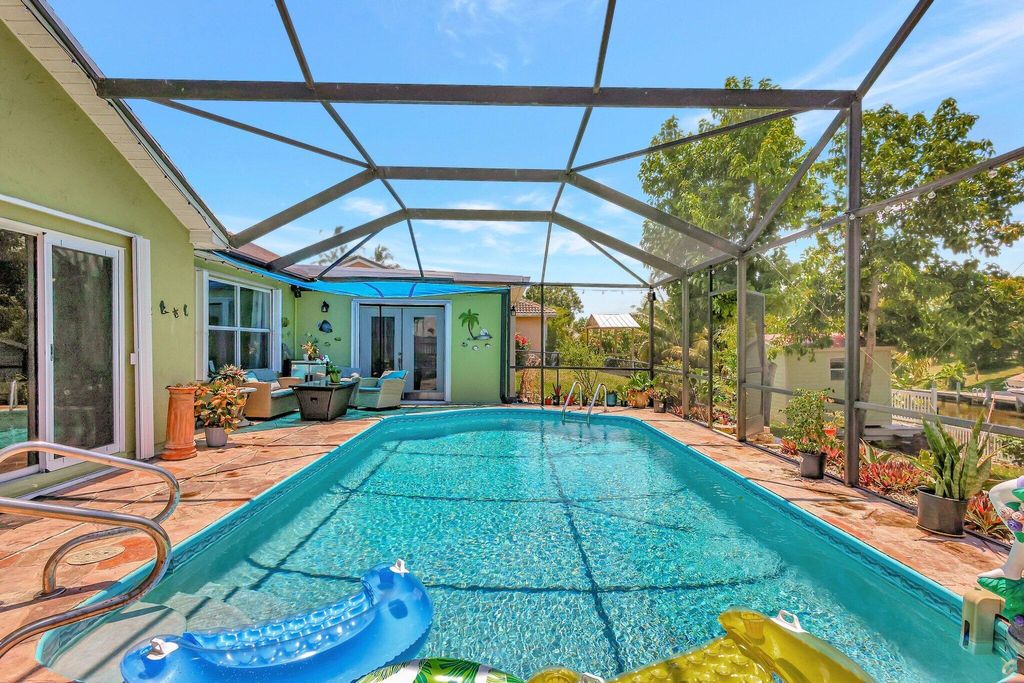 Photo of 197 NE Sagamore Terrace, Port Saint Lucie, FL 34953 (MLS # R10991677)