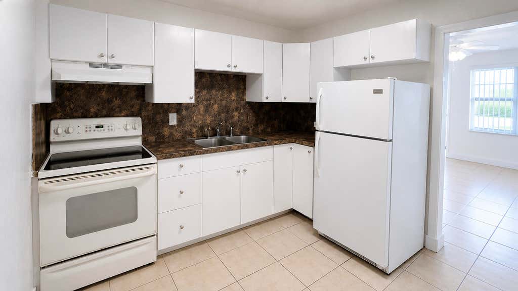 Photo of 3970 NW 31ST Terrace #1, Lauderdale Lakes, FL 33309 (MLS # B26060057)