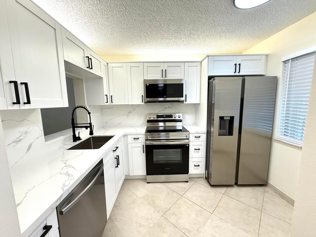 Photo of 6649 Somerset 205 Drive #205, Boca Raton, FL 33433 (MLS # R11102735)