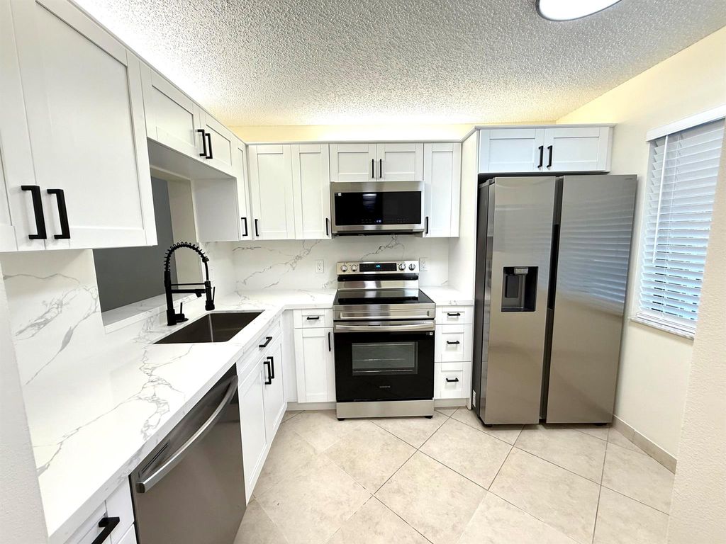 Photo of 6649 Somerset 205 Drive #205, Boca Raton, FL 33433 (MLS # R11102735)