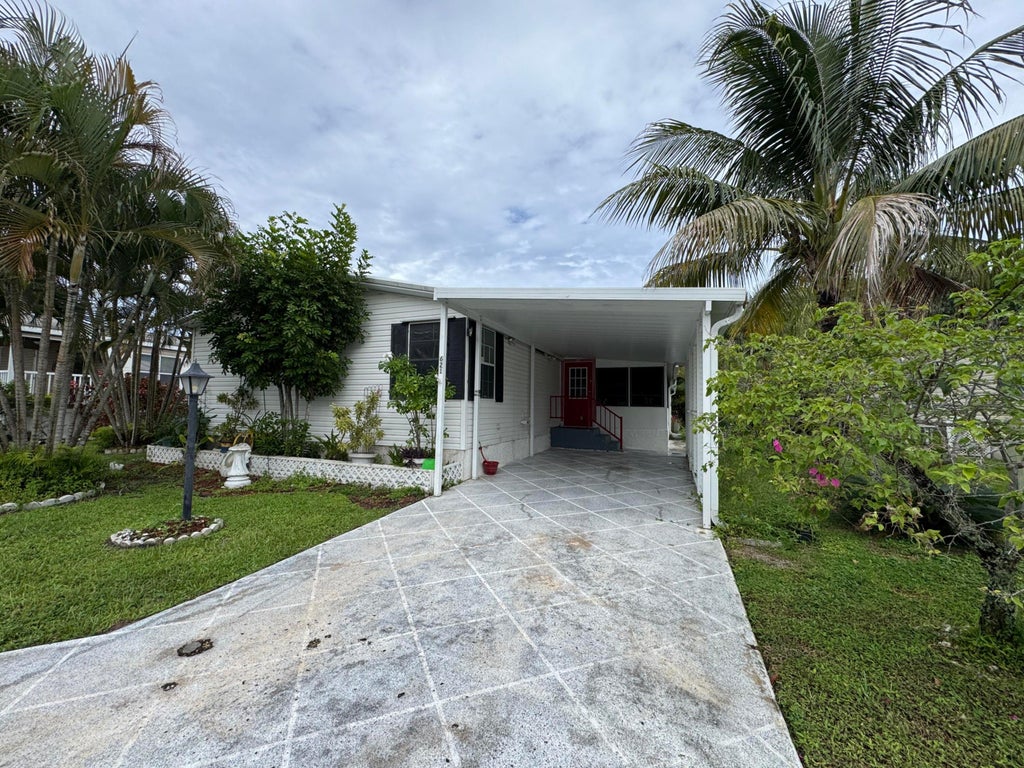 Photo of 621 Sunny S Avenue, Boynton Beach, FL 33436 (MLS # B26082412)