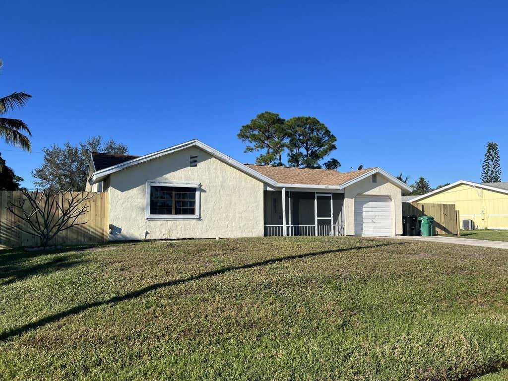 Photo of 142 SE Whitmore Drive, Port Saint Lucie, FL 34984 (MLS # R11053206)