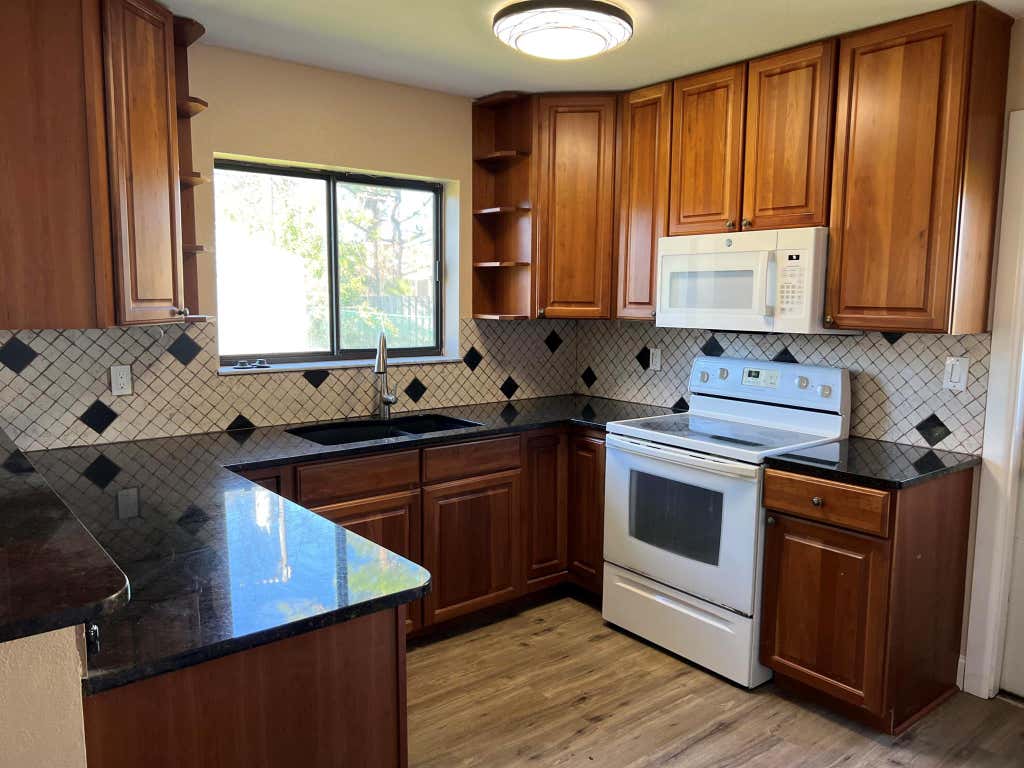 Photo of 142 SE Whitmore Drive, Port Saint Lucie, FL 34984 (MLS # R11053206)