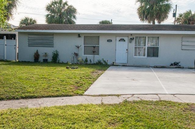 Beautifully remodeled 4-bedroom, 3-bathroom home with a fully updated kitchen featuring stainless nice appliances and an open design. ONE OF The masters suite is a mother-in-law suite for added versatility. The home boasts ceramic tile and laminate flooring through. It also includes a brand-new washer and dryer, a spacious fenced yard, and a separate air conditioning unit. Windows are fitted with storm shutters or impact-resistant glass. this property is Located just three blocks from the Barracuda Bay Aquatic Complex, a fun-filled water park in Riviera Beach offering pools, splash zones, and slides.