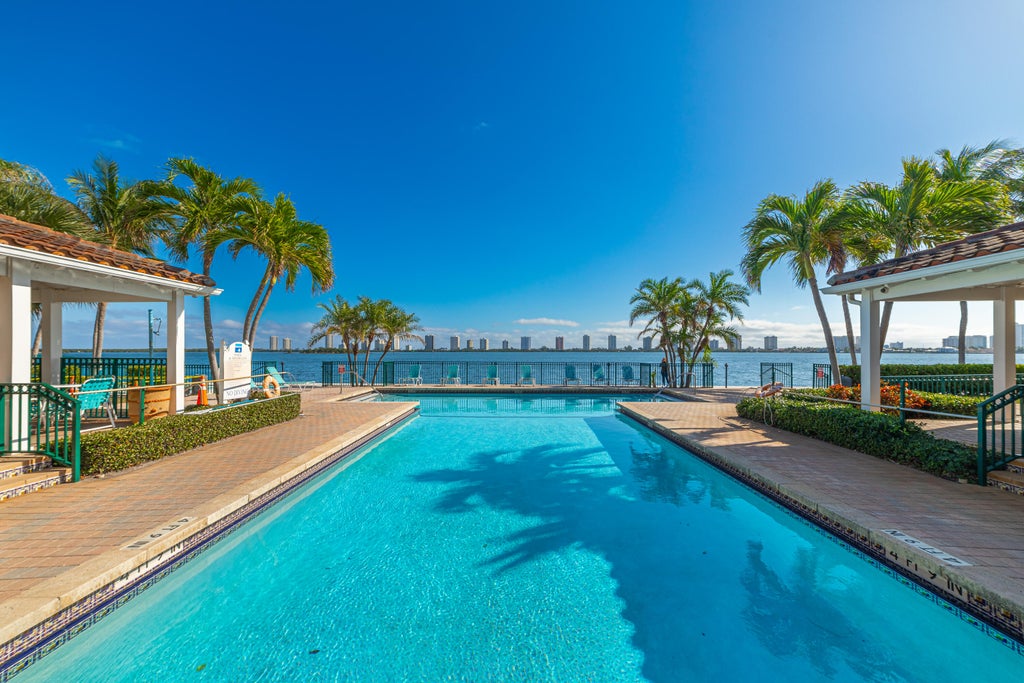 Photo of 1145 Lake Shore Drive #206, Lake Park, FL 33403 (MLS # B26065506)