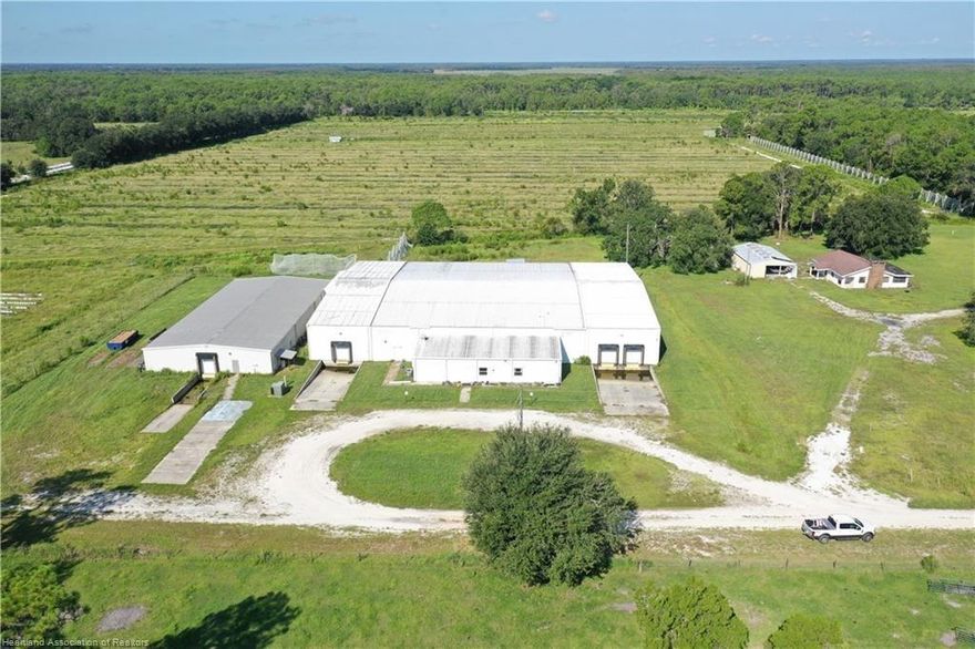 30,000+-SF Blueberry Packing House w/ Equipment, 83+-High-fenced Farm turn-key with irrigation/wells Home/ Barn All Vacant & with a Proforma Cap Rate of 12% & Breakup Allocation of value at $3M+-! Air Conditioned Packing House is in Excellent Condition + farm have some deferred maintenance. Packing Facility: 1600+-SF finished office with multiple private offices, main packing area of 20K+ SF with equipment & some packing supplies then two 18+-Ft high ceiling like new loading processing areas with exterior sunken docks / high roll up doors for semi’s both located on each end of the main bld. Blueberry farm has 14” well 1300+-Ft deep at the south middle with surface water well at rear & 2” well at the north all watering all at once for cold protection (overhead & drip irrigation).