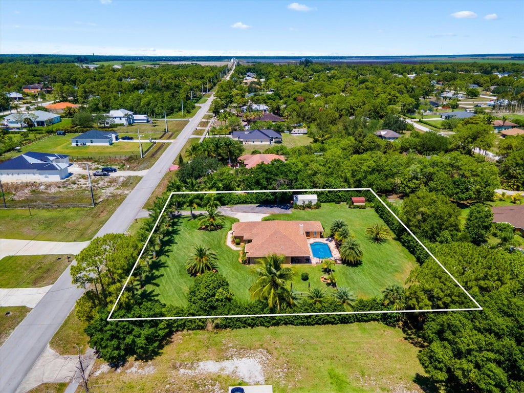 Photo of 17315 Orange Boulevard, Loxahatchee, FL 33470 (MLS # R11146380)