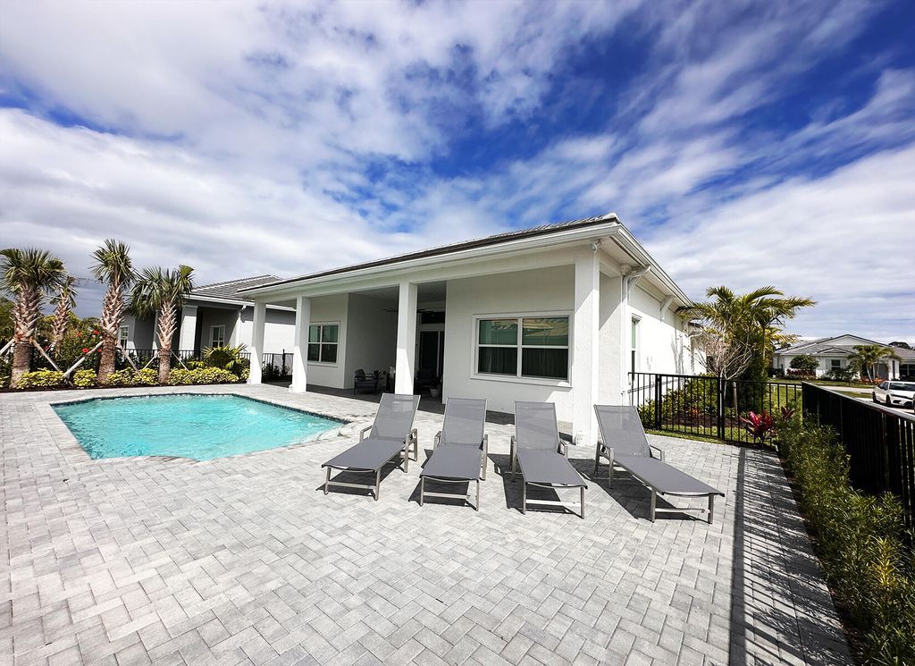 Photo of 10027 Timber Crk Way, Palm Beach Gardens, FL 33412 (MLS # B26006241)