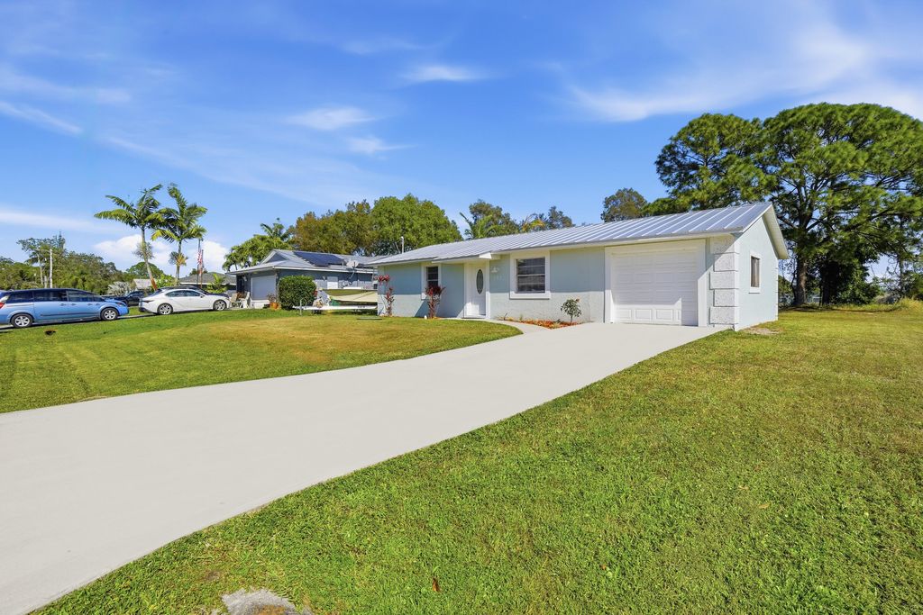 Photo of 381 NW Curtis Street, Port Saint Lucie, FL 34983 (MLS # R11159130)