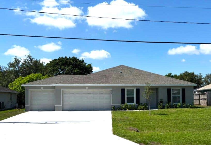 Photo of 434 SE Oakridge Drive, Port Saint Lucie, FL 34984 (MLS # R11039142)