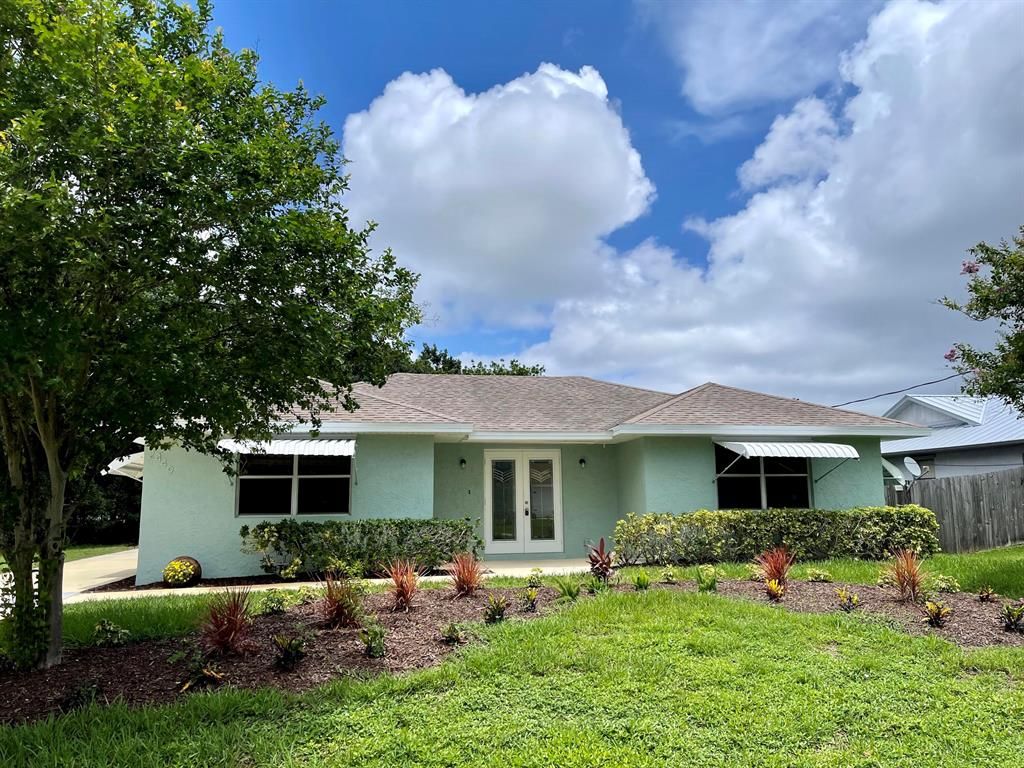 Photo of 2449 SE Sidonia Street, Port Saint Lucie, FL 34952 (MLS # R10727314)