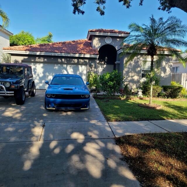 Photo of 4323 NW 44th Terrace, Coconut Creek, FL 33073 (MLS # B26042253)